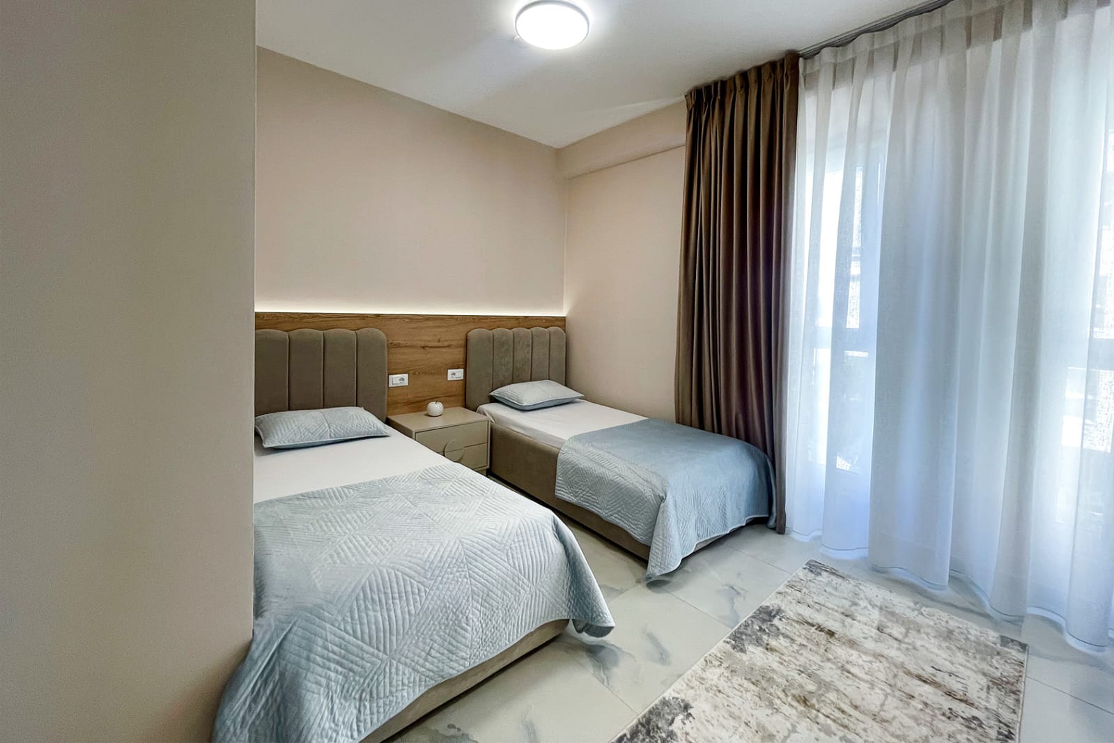 Second bedroom — two single beds